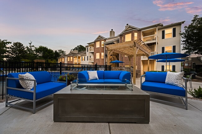 Poolside fire pit and outdoor kitchen