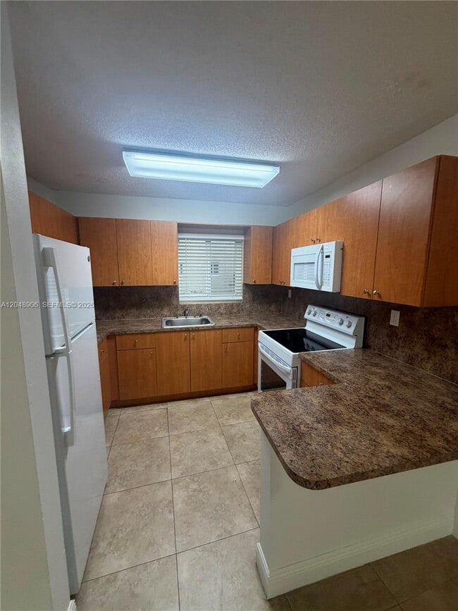 Photo - 1650 W 44th Pl Unit 119