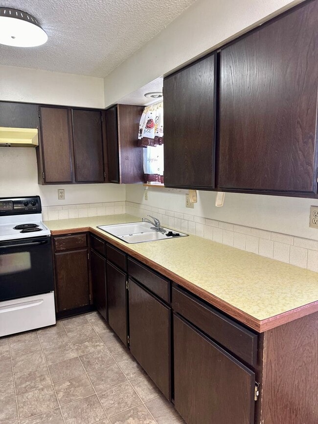 Photo - Hard to find 2 bdrm, 1.5 bath unit with water, sewer, and garbage. Onsite laundry and A/C!