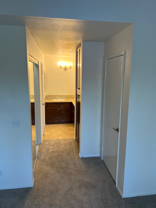 Hallway to Bathroom - 23412 Pacific Park Dr Unit 17F