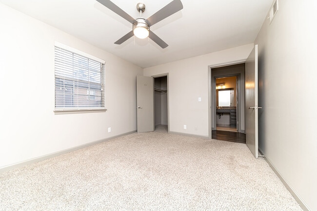 Bedroom with carpet & ceiling fan
