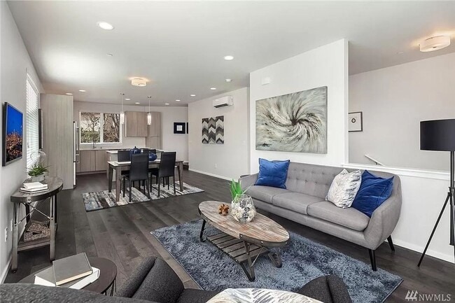 Photo - Spacious 4-Bed, 2.5-Bath Townhome with Mod...