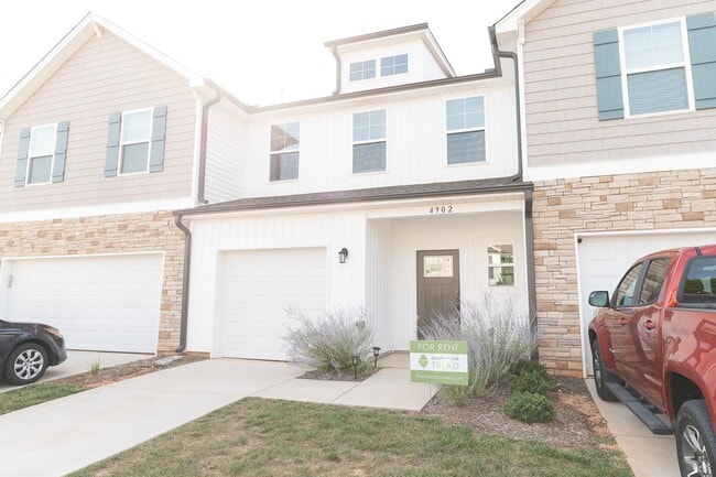 Photo - Like new modern maintenance free 3 bedroom 2.5 bath townhouse in Greensboro. Lawn care included.