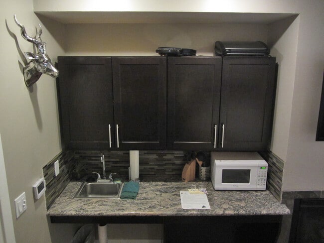 Kitchenette - 4069 Cedar Ave Unit Studio for assist. Manage