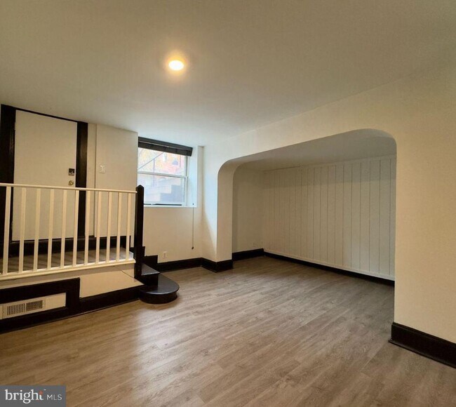 Building Photo - 1210 N Calvert St Unit T