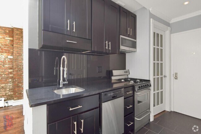 Building Photo - 411 E 12th St Unit 2 Rental