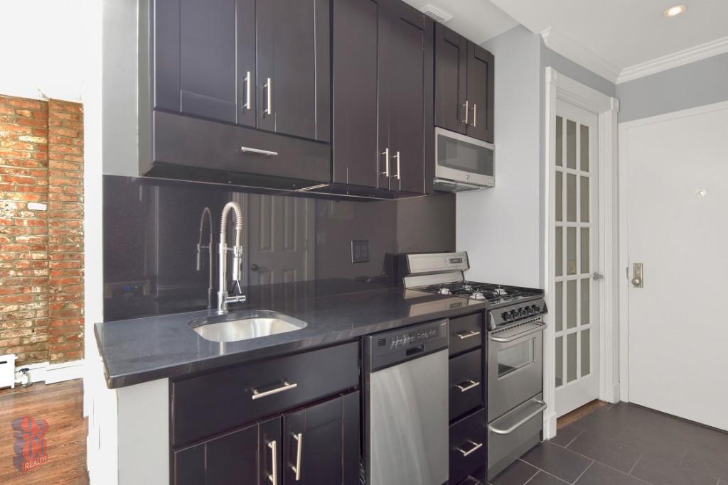 Photo - 411 E 12th St Apartment Unit 2