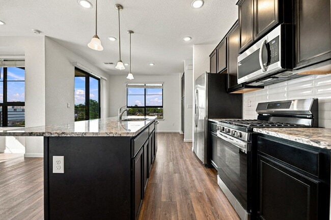Photo - $2,450.00 2 bed, 2.5 bath located in Denver with Central AC, and In Unit Laundry! Unit #3