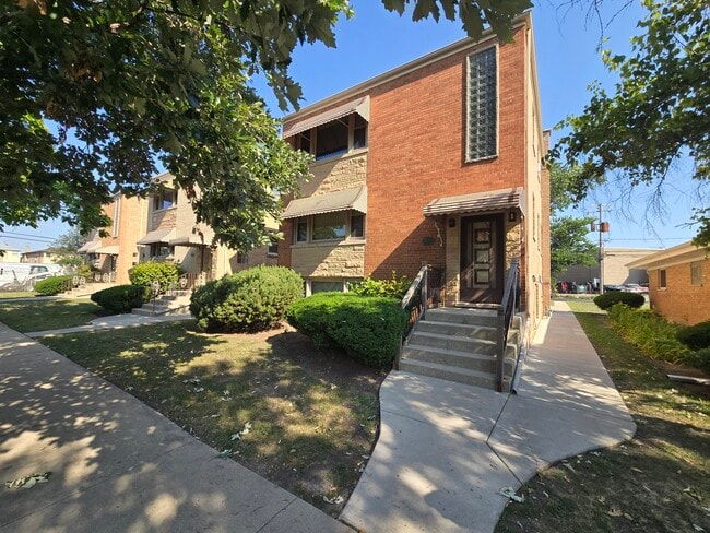 Building Photo - 7124 W Jarvis Ave Rental