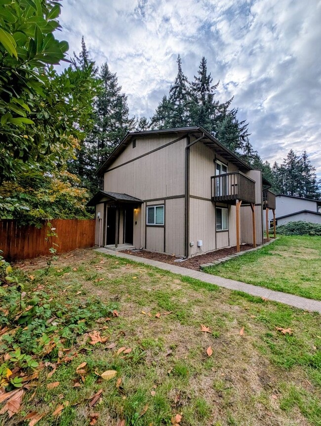 Building Photo - 2 Story Duplex Available. HUGE, FENCED YAR...