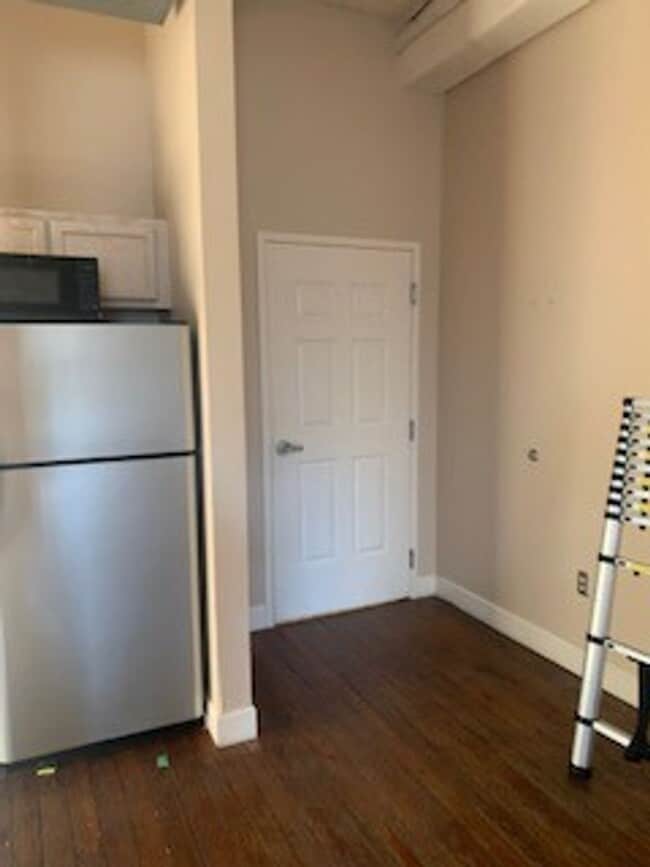 Photo - Downtown Studio at Riverviews — Exposed Brick & City Views