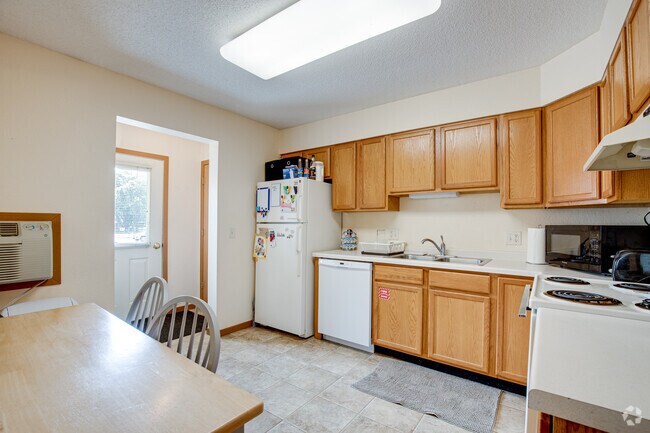 Kitchen, Dining Area and Front Entrance