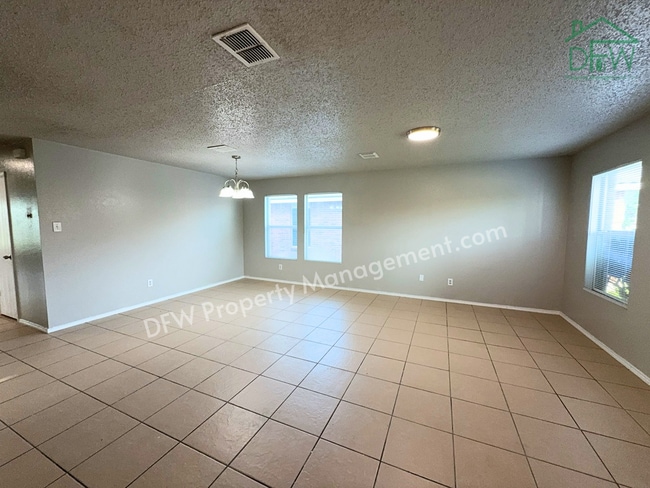 Photo - Spacious 4-Bedroom Home with Fireplace & Large Backyard in SW Fort Worth