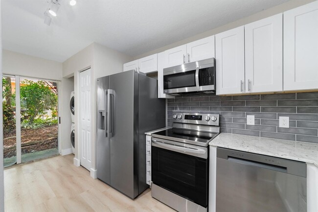 Building Photo - 3750 N Jog Rd Unit 105 Rental
