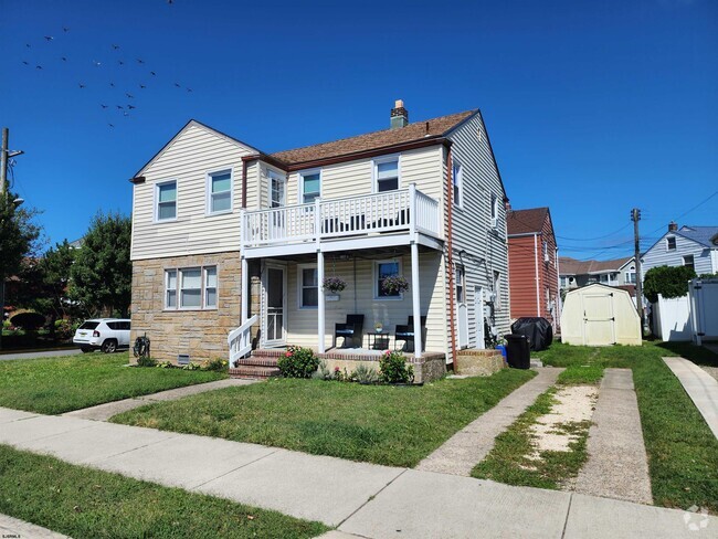 Building Photo - 9105 Amherst Ave Unit 2nd Floor Rental