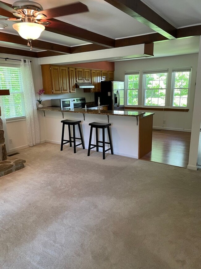 Photo - Plenty of Storage and Fenced in yard!