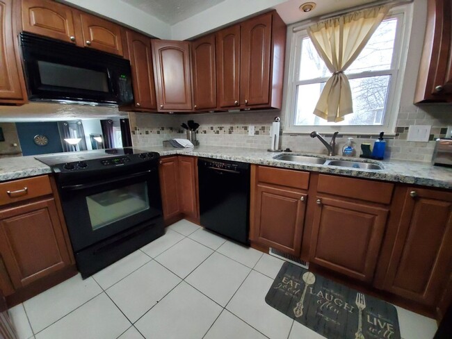 Photo - Furnished family home with large fenced ba...