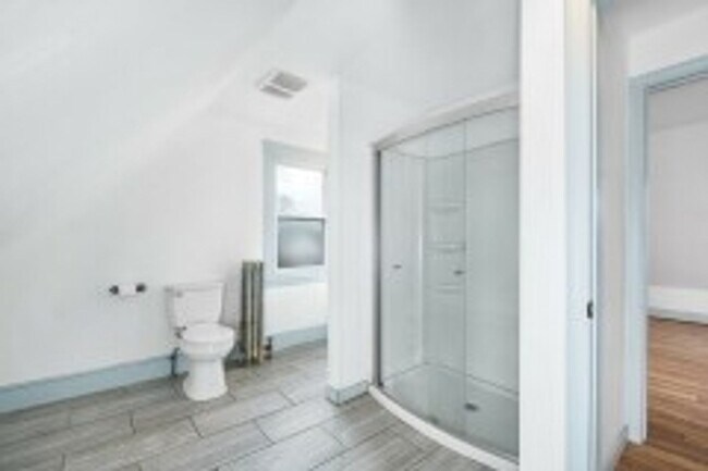 Photo - Renovated 4BR with In-Unit Laundry Near Moody Street