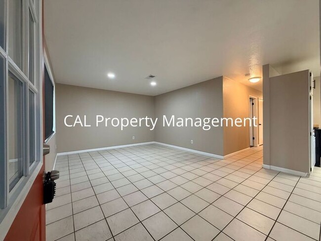 Photo - Spacious 4-Bedroom Home with 2-Car Garage & Backyard Oasis