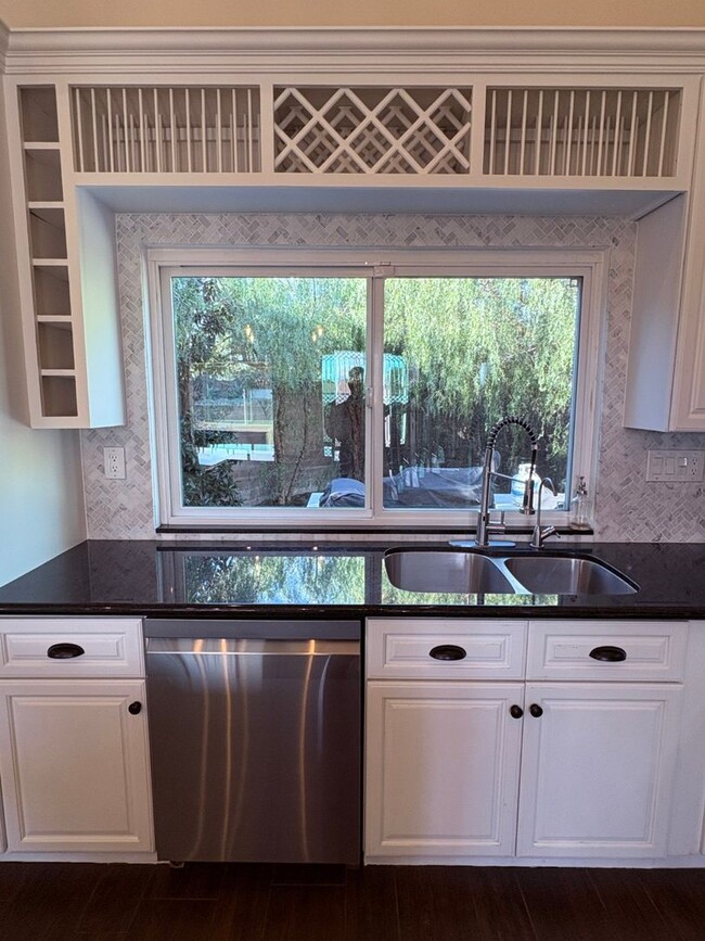 Photo - Upgraded 3 bedroom, 2 1/2 bath home with HUGE private yard.  This is a true hidden gem.