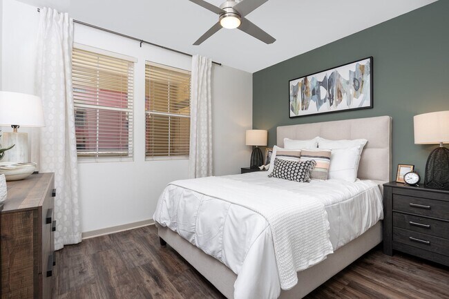 Luxury vinyl plank flooring and ceiling fan in renovated floor plans