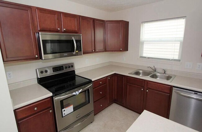Photo - LINDBERG VILLAGE...3 Bedroom 2 Bath House w/ fenced backyard