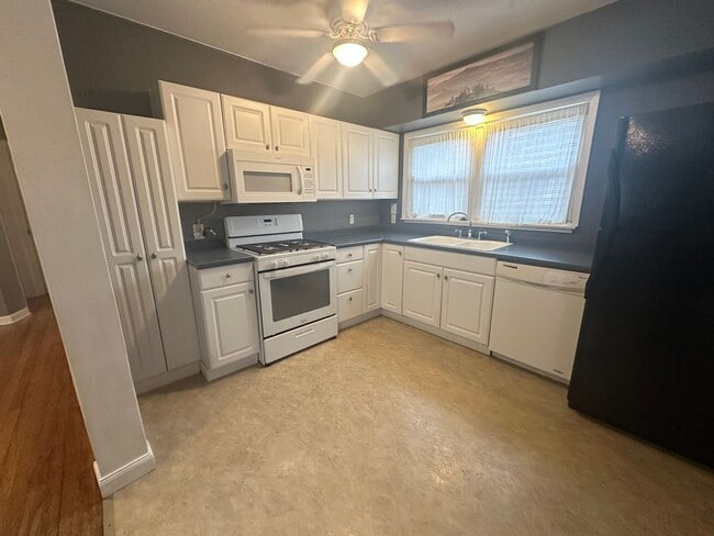 Photo - Charming 2 bedroom, 1 bath on a corner lot with large fenced backyard.