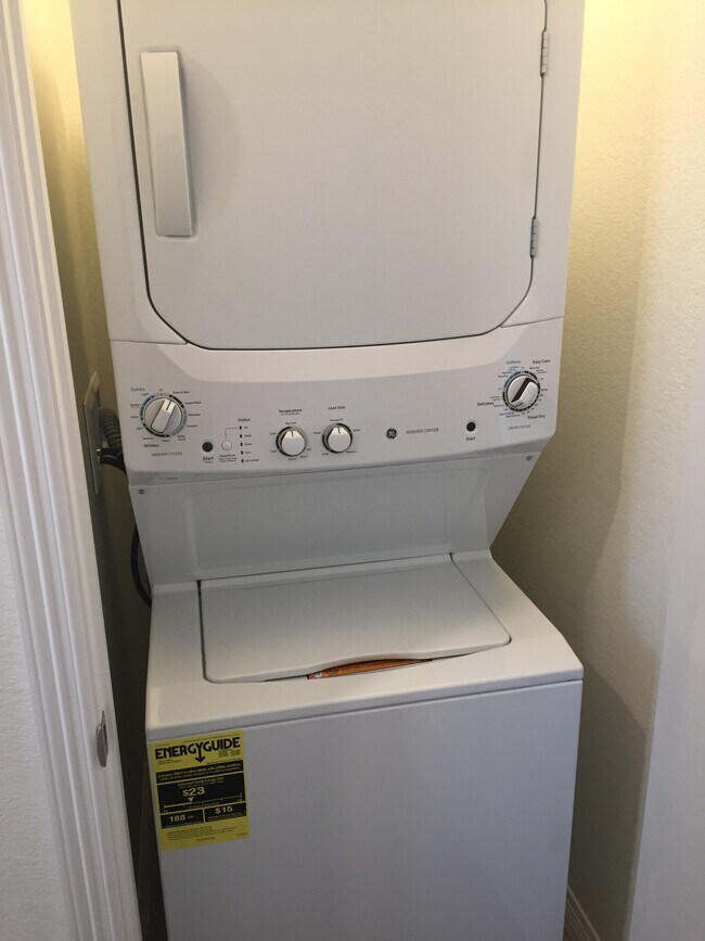 Washer and dryer included in unit.