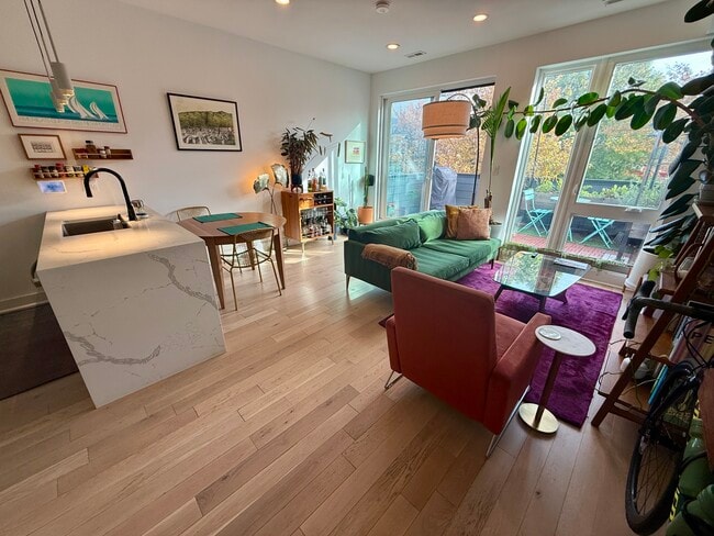 Living room and main spaces have 9' ceilings and floor-to-ceiling windows - 3916 14th St NW Unit 3