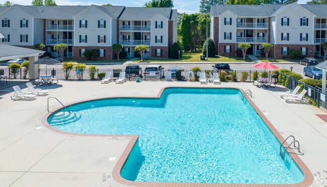 Resort-Style Swimming Pool with Lounge Seating