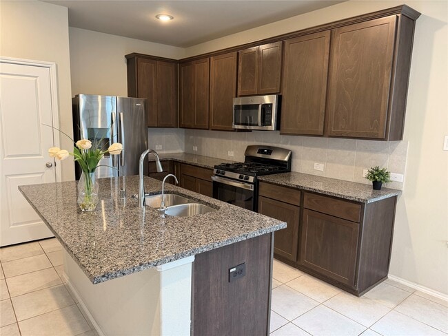 Photo - 8711 Windsong Trail Dr