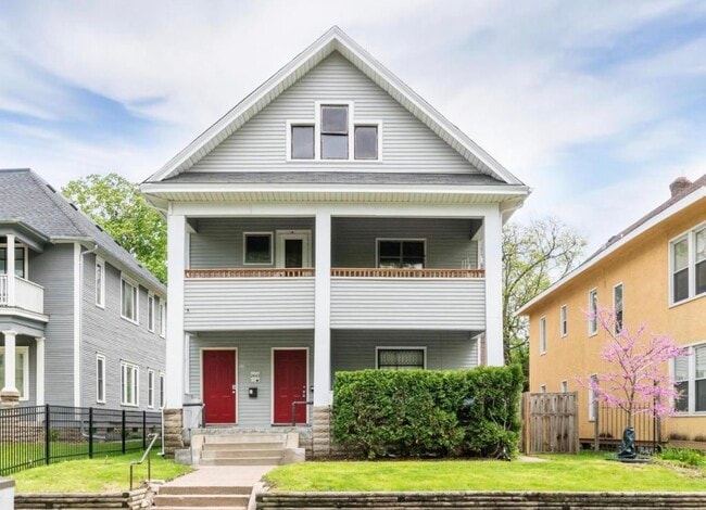 Building Photo - 2642 Emerson Ave N Unit 2