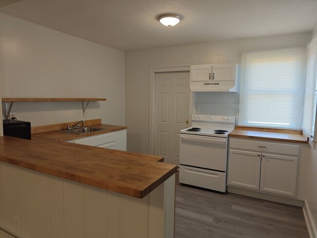 Photo - Charming 2-Bedroom Home with Spacious Yard