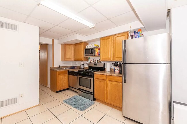 Building Photo - 2303 Olive St Unit 1