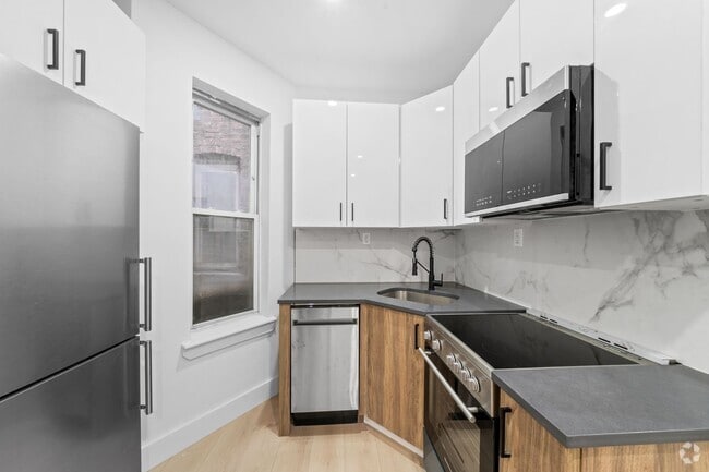 Building Photo - 514 E188 BH LLC Unit 2 Rental