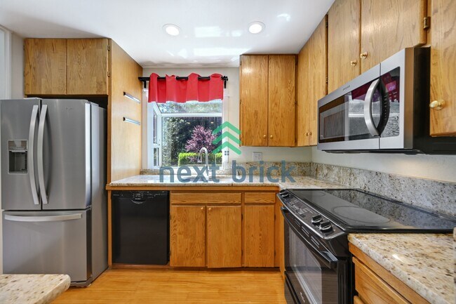 Photo - "Discover Spacious Comfort for multi-generational living: 4-Bedroom Home with additional kitchene...