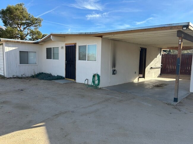 Front yard and carport - 7444 Borrego Trl Unit B