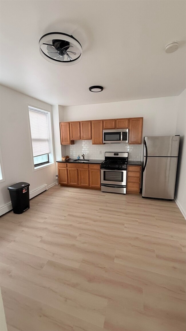Building Photo - 599 60th St Unit 1