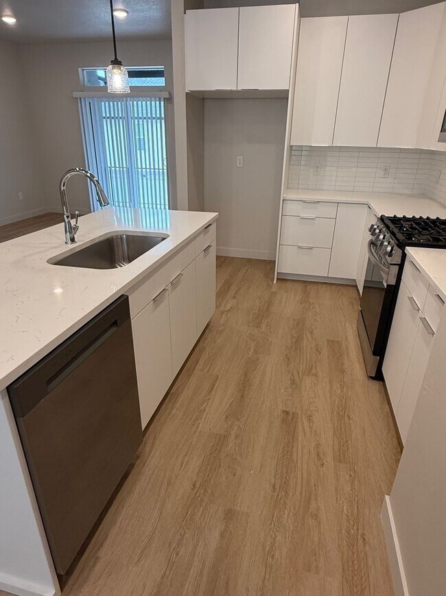 Photo - Half off first months rent - Beautiful townhome, construction just completed, 2 car garage, centr...