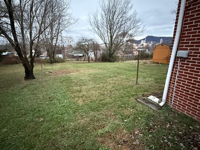 Photo - Updated 4BR Home with Finished Basement & Level Yard