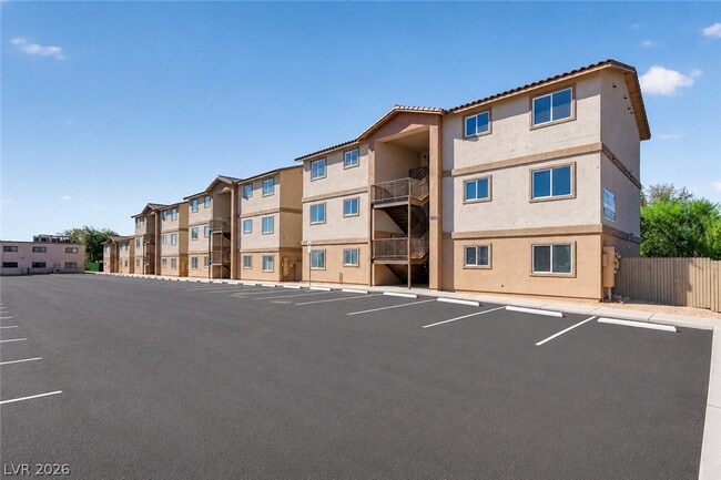 Building Photo - 2301 Seco Adobe Cir Unit 204