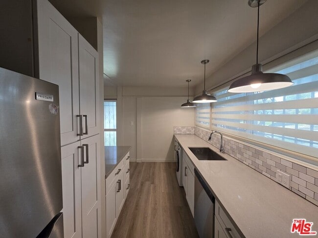 Building Photo - 11021 Missouri Ave Unit 11041-1 Rental