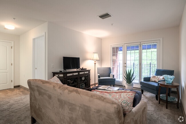 2BR, 2BA - 1,000SF - Living Room - The Waterford