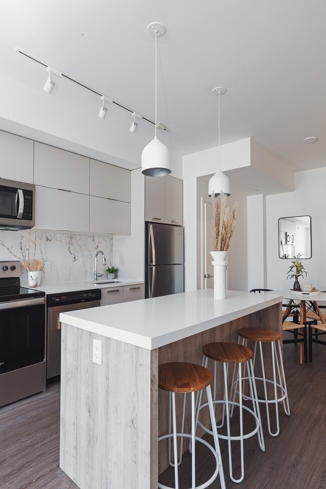 Building Photo - Switzer on Main – Modern Living in the Hea... Unit 210