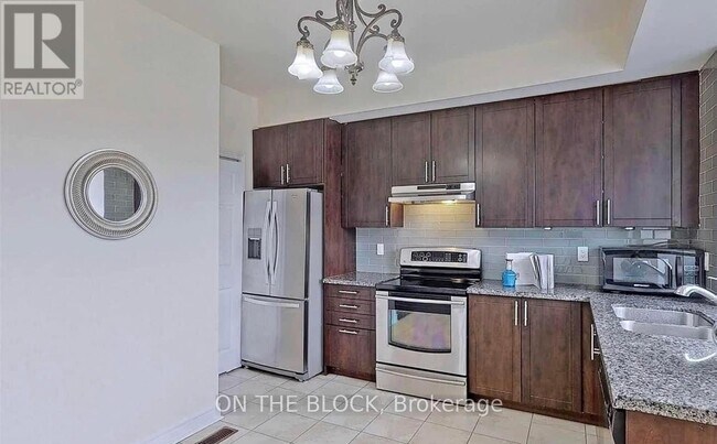 Photo - 3761A St Clair Ave E