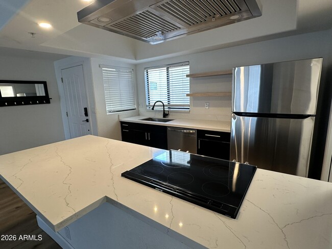 Building Photo - 10401 N Saguaro Blvd Unit 214