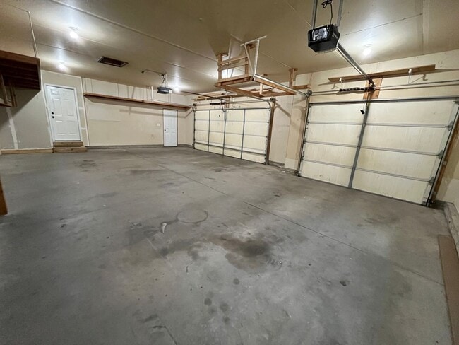 Photo - Stunning 4 Bed/2 Bath with 3 Car Garage and Fenced in Yard!