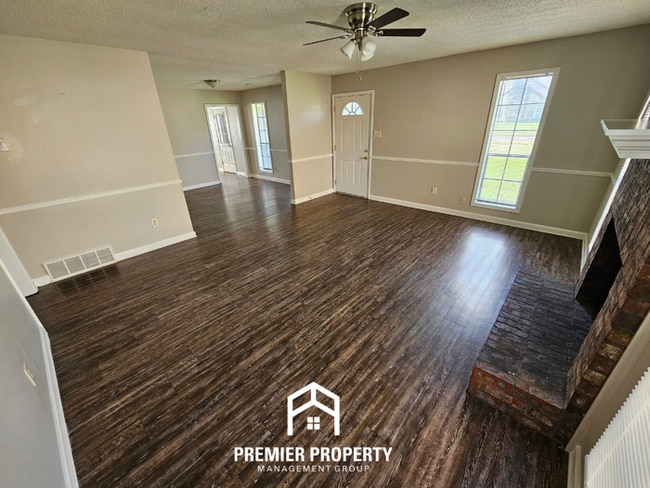 Photo - Charming 3BR/2BA Kirby Mills Cove | Hardwood Floors, Rustic Brick Fireplace & Garage