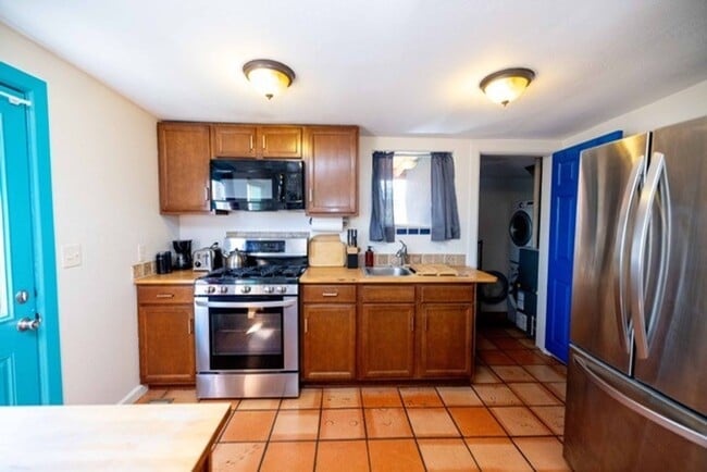 Photo - Modern Comfort with Fireplace & Yard | 2BR...