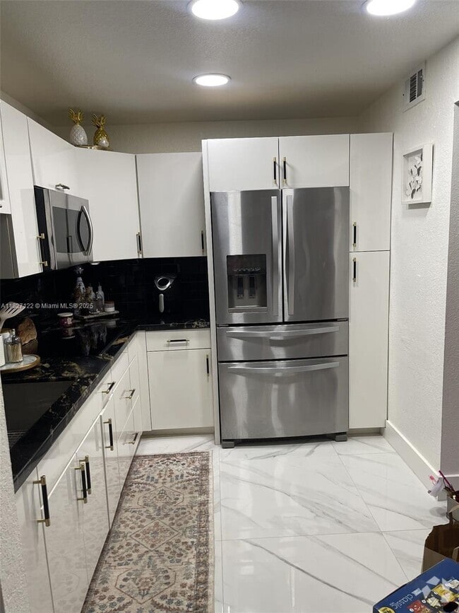 Building Photo - 7120 Fairway Dr Unit L5 Rental